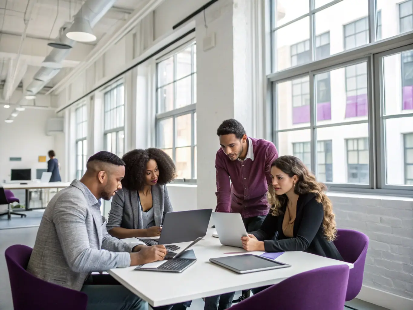 A diverse team of technology consultants brainstorming innovative solutions in a modern office setting, emphasizing collaboration and expertise.